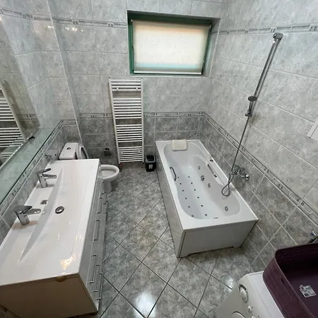 1 Apartament *